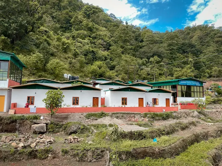 Yoga school campus surrounded by forest in Rishikesh