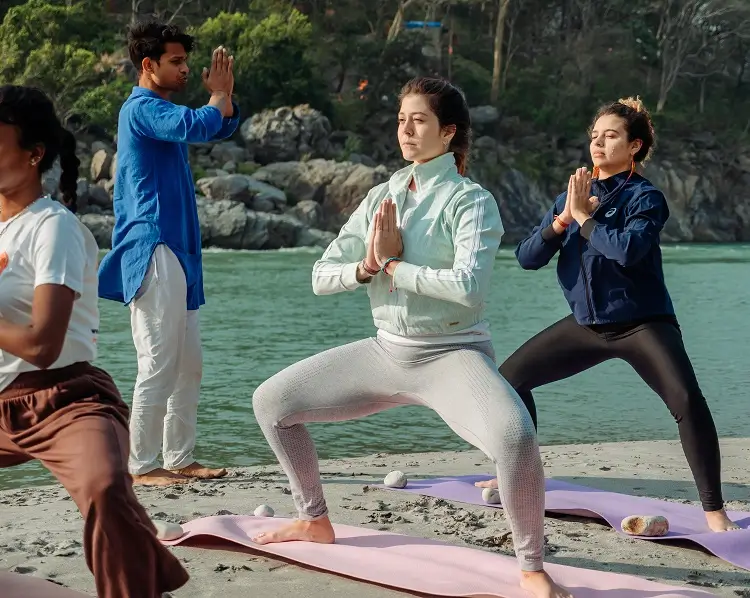 Rishikesh Yog Kendra Students meditating during the mindfulness retreat at Rishikesh Yog Kendra